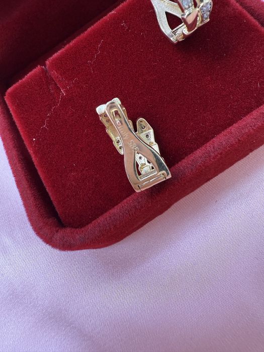 Золотые серьги змейка