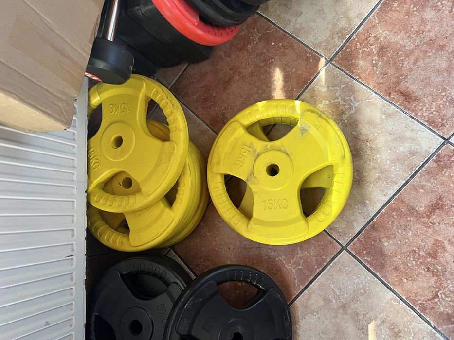 Discuri haltera 15 kg noi maner grip profi 30 mm. fonta+cauciu Germany
