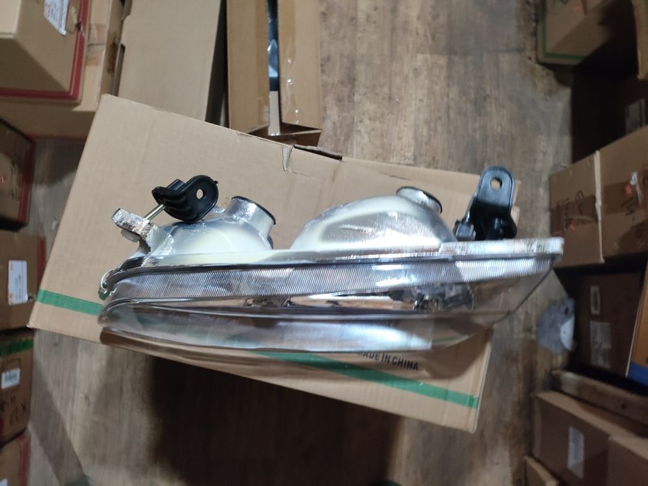 Камри 25 фара Америка