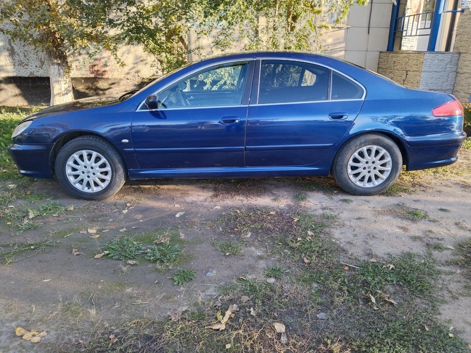 Пежо 607. Обём двигателя 2,2.