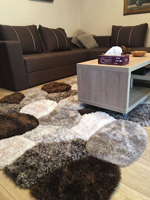 Canapea tip coltar cu doua spatii de depozitare, din care unul cu sistem de rabatare + fotoliu, produse de Sofa, in stare buna, saltea relaxa