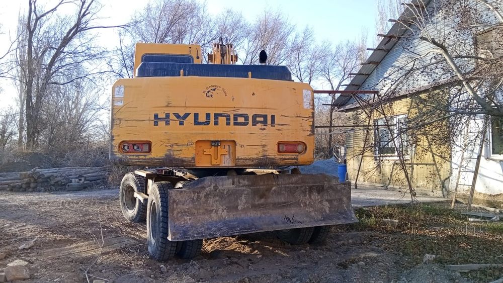 Экскаватр Хундай 140w