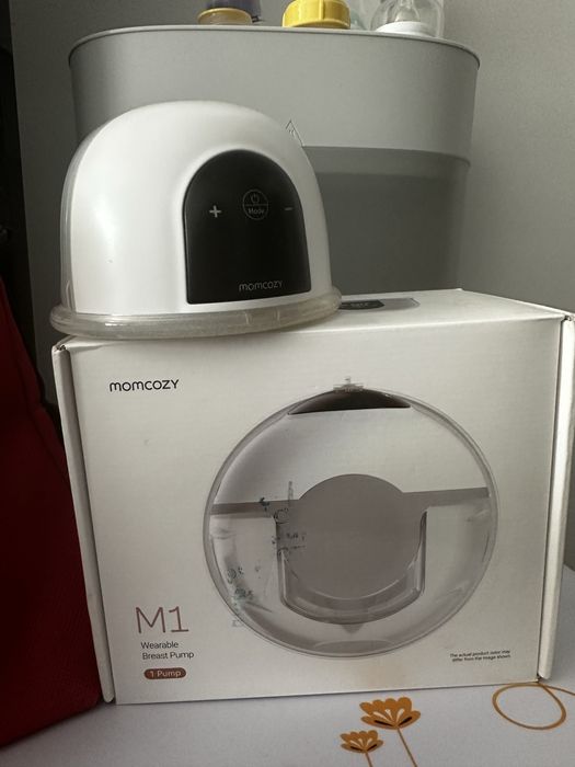 Бебешки принадлежности помпа за кърма Medela MomCozy, раница Ergobaby , стерилизатор Philips Avent , везна , гимнастика Tiny Love , шишета Haakaa