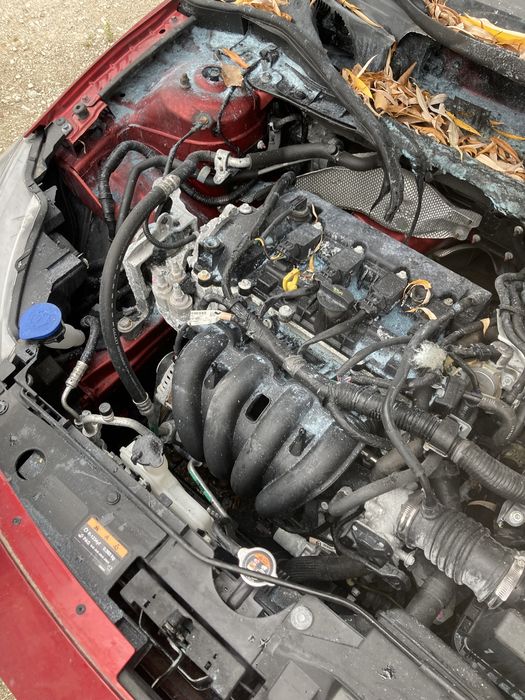 Mazda 2  на части