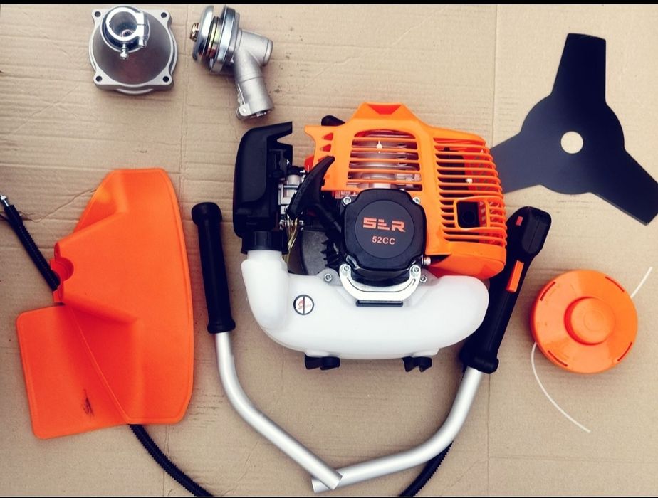 Триммер новый,сдвумя ножами