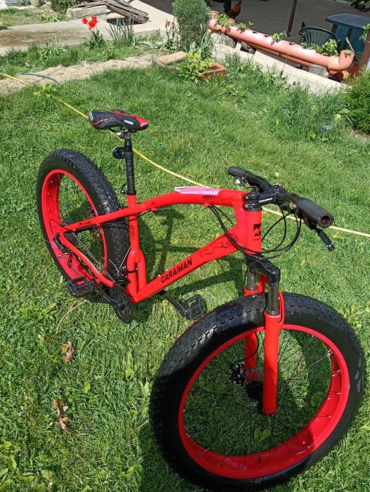 Vând bicicleta  Bicicletă FatBike Fulger by Caraiman, roți 20 inch, cauciucuri groase, frâne pe disc, roșie