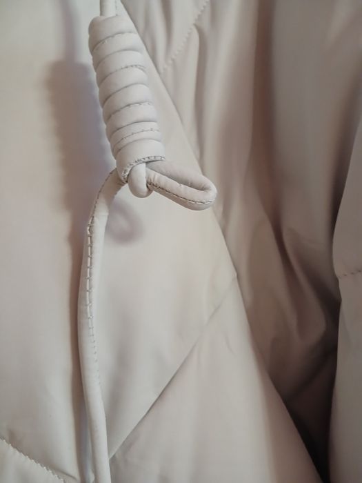 Продам пуховик новый