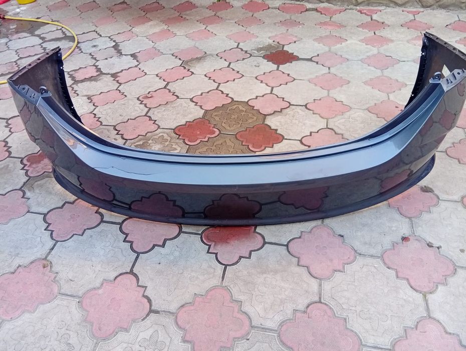 Продам Hyundai Accent задний бампер оригинал