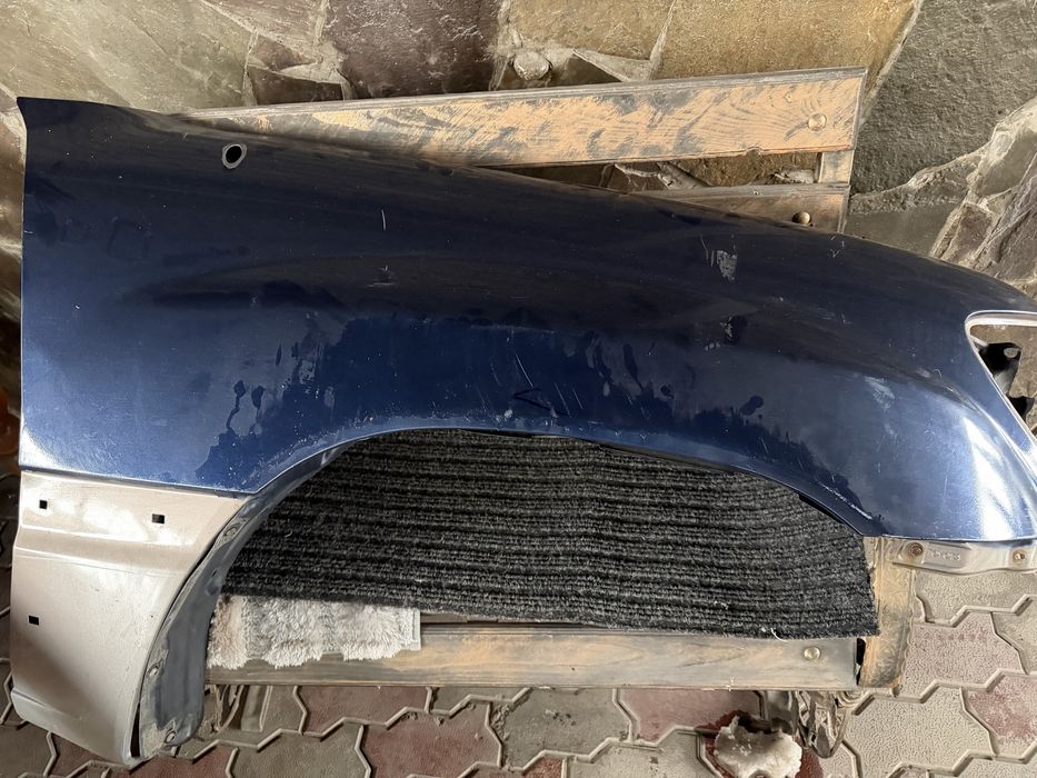 Двери и крыло от крузака 100