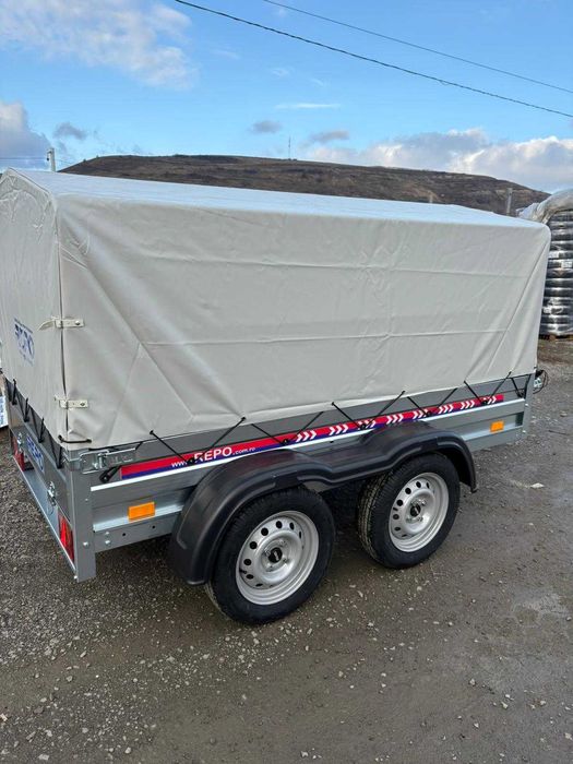 Remorca 2 axe 750 kg,235X124X32  TOTUL INCLUS,produs in RO.