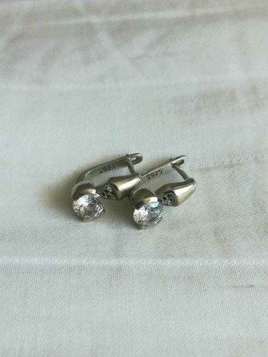 Продам комплект сережек и колец