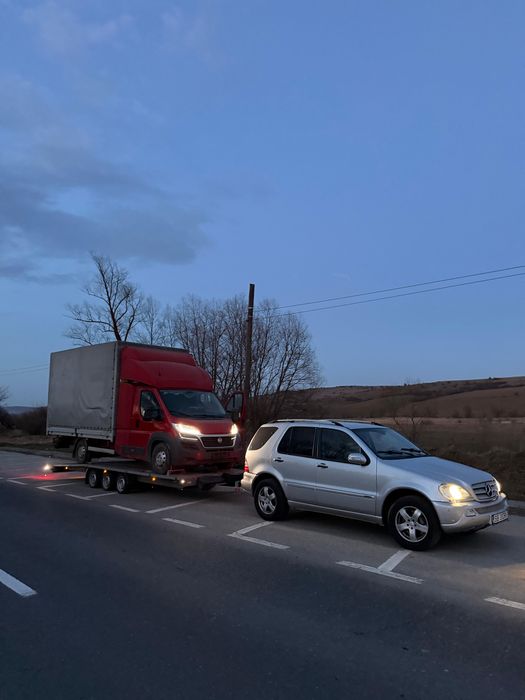 Tractari auto Sibiu,recuperare din autostrada ,utilaje, platforma