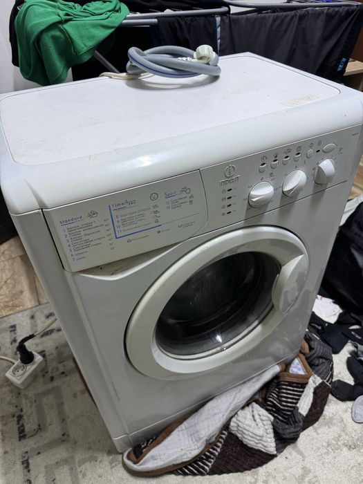 Стиралка жұмыс істеп тұр