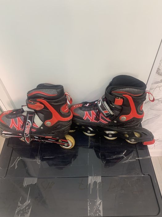 Роликовые коньки