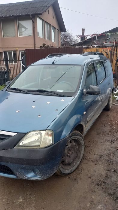 Vând  (sau schimb) LOGAN MCV 2009