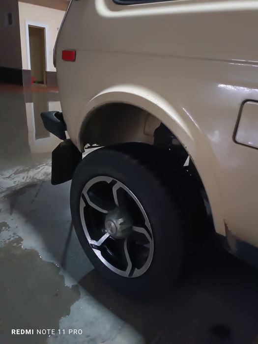 Диски и шины на  Волга Нива  комплект