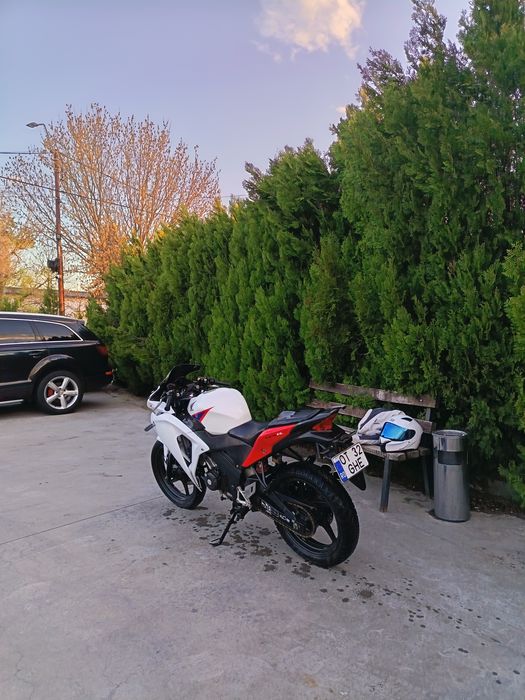 Vand honda Cbr125R oferim transport contracost