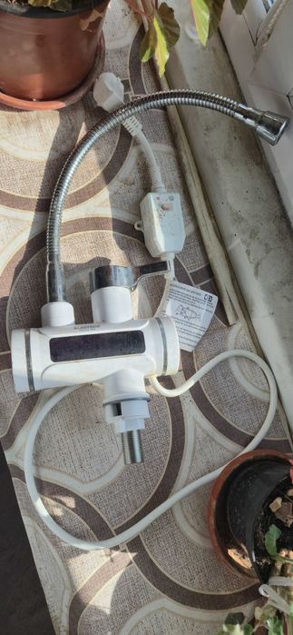 Vând robinet electric Albatros