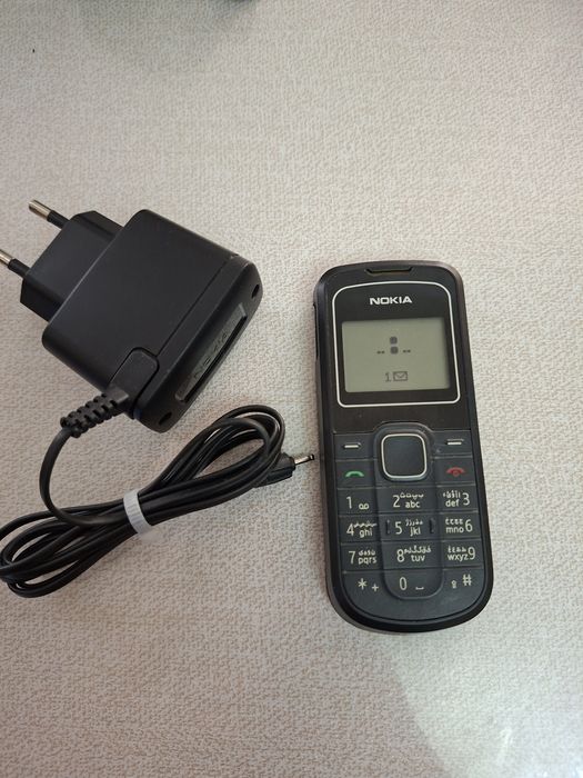 Nokia 1202 Original Zaryadchik bilan
