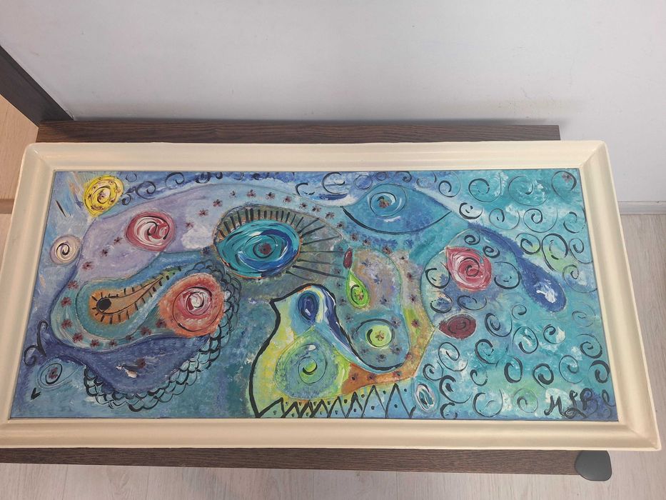 Tablou pictat reprezentand o pictura abstractă.