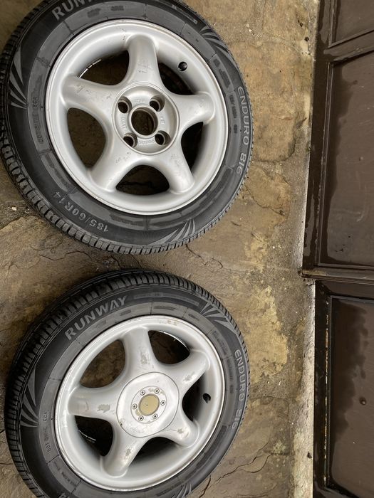 Продавам 4 алуминиеви джанти с летни гуми с размер 185/60 R 14 82 H