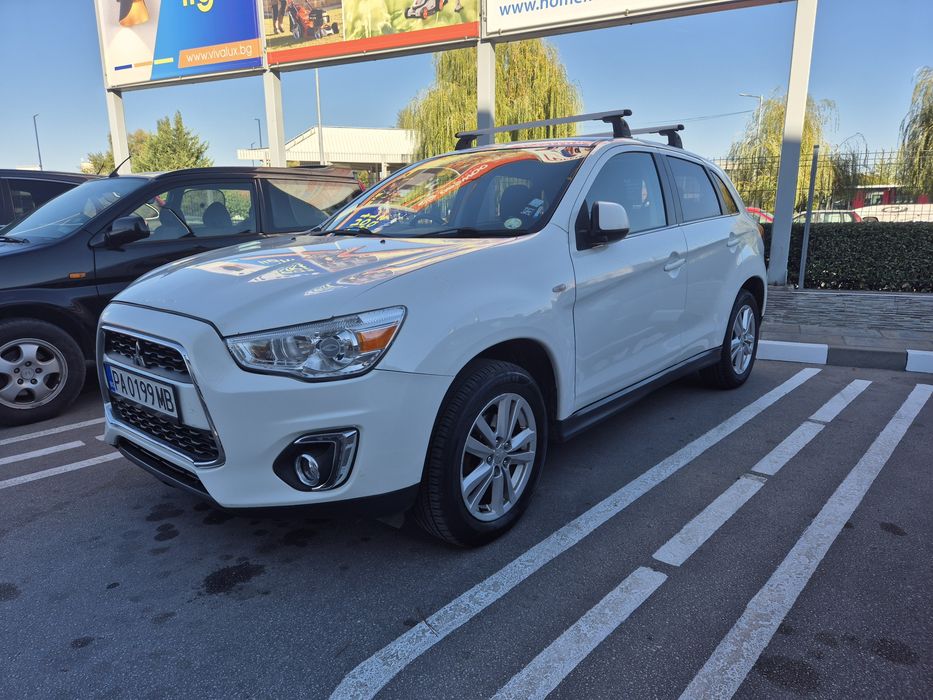 Mitsubishi AXS 2013год.