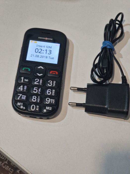 Telefon cu butoane cu încărcător