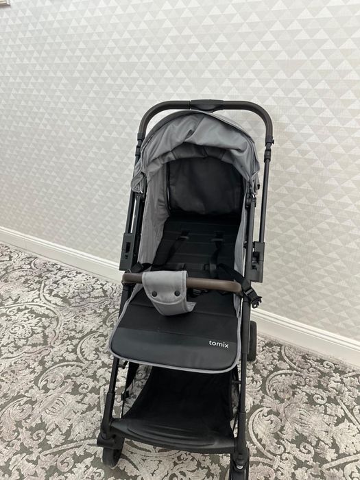 Прогулочная коляска от tomix flip