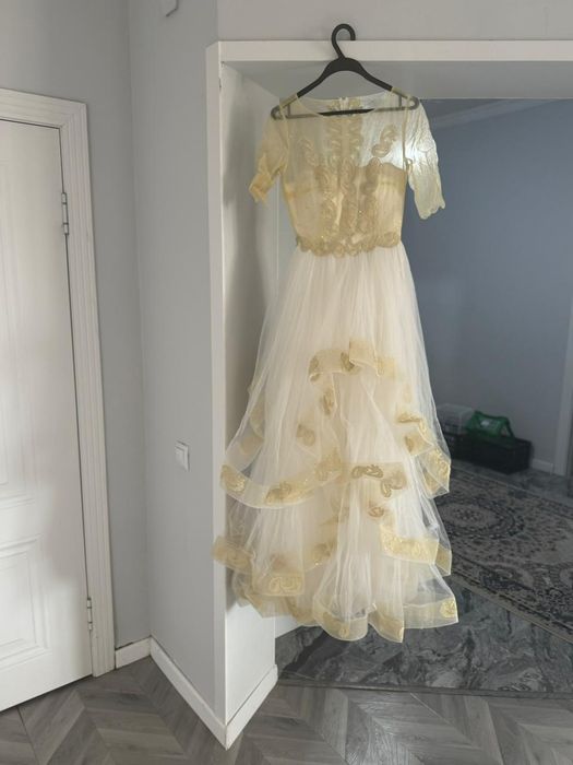 Продам свадебное новое платье