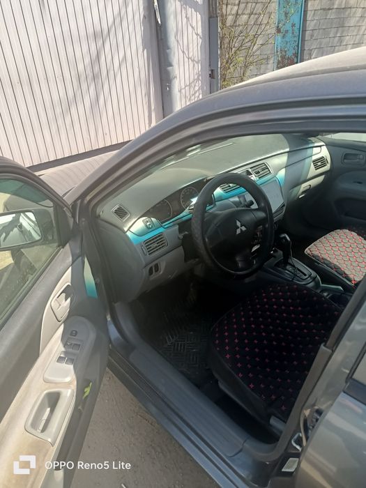 Авто Митцубиси Ланцер 2011г.