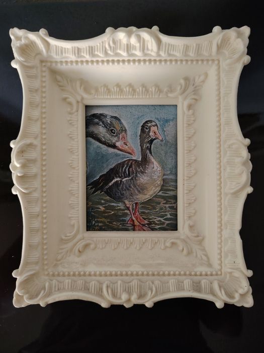 Две картины птиц с белыми рамками