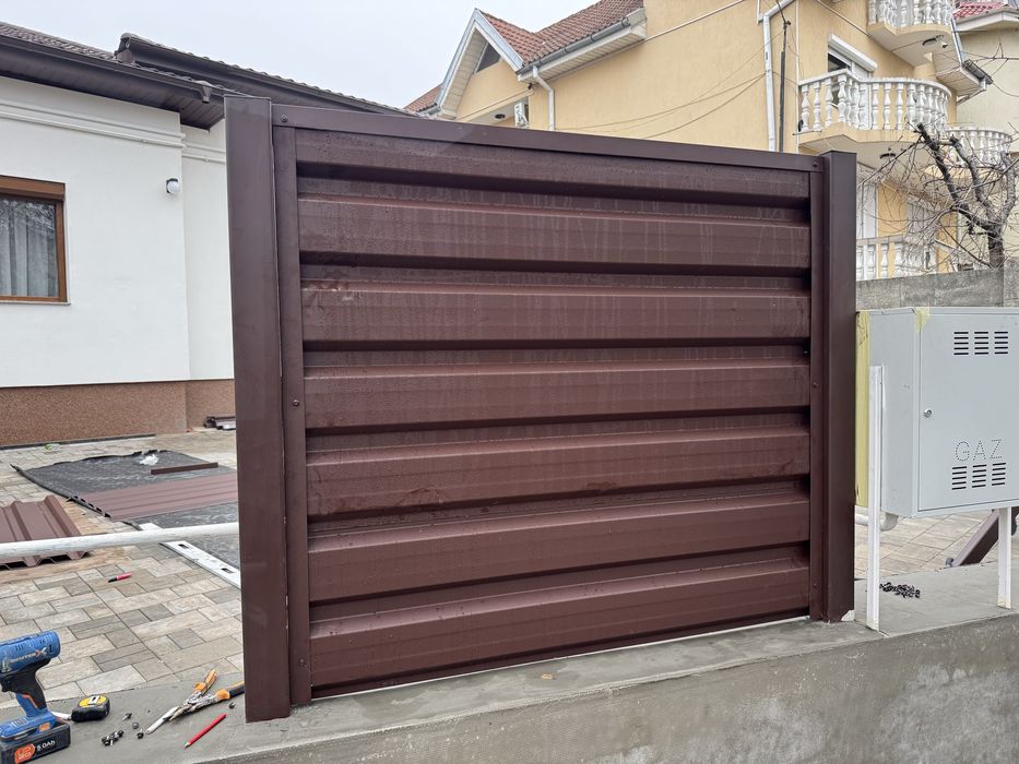 Gard din tabla cutata model T35 dublu vopsita mat 0.40mm 48 lei/mp