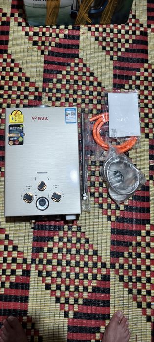 Продам новую газовую колонку срочно