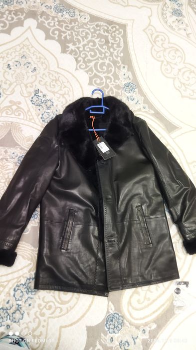 Продам зимнюю кожаную куртку 54 размер