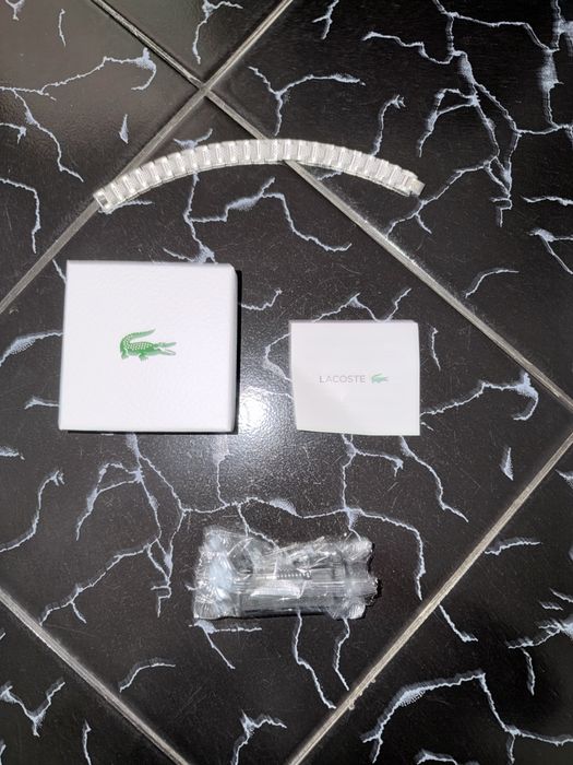 Bratara Lacoste.