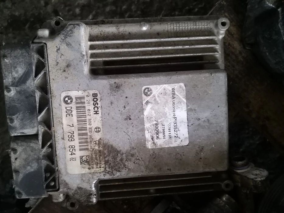 Calculator ECU cod: DDE7799854 pentru BMW Seria 1 118D E87