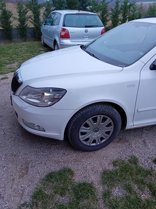 Aripa stanga skoda octavia 2 facelift 2009-2013