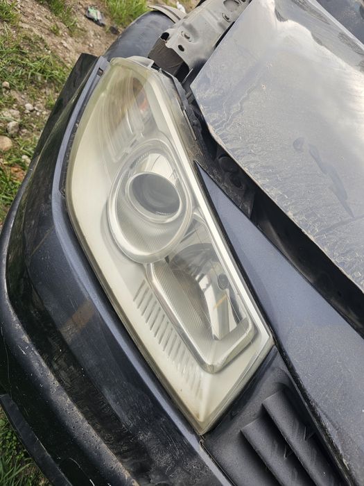 Far stânga dreapta cu lupa Renault megan 2 an 2005