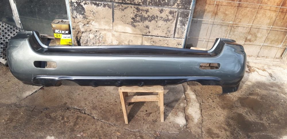 Продам задний бампер на субару оутбак