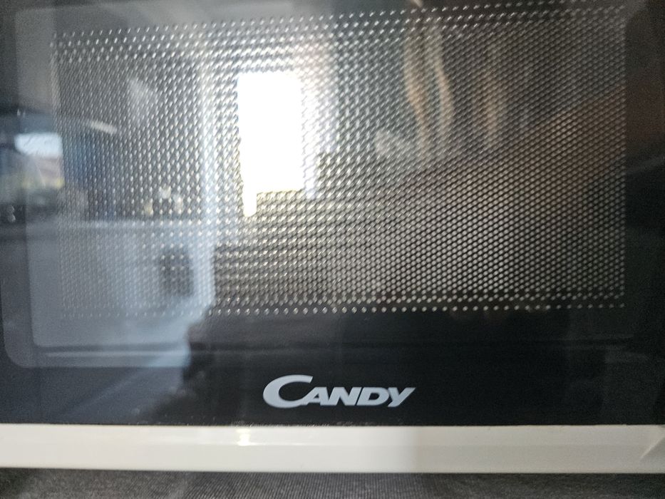 Microunde Candy utilizat o singura data