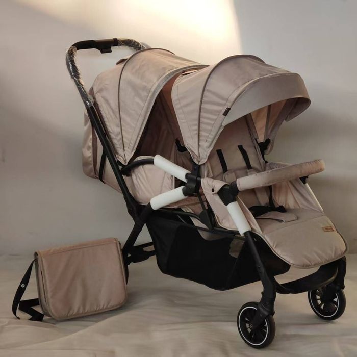 Коляска для двойни паравоз