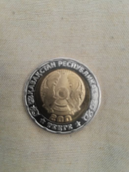 Монета 80 летние