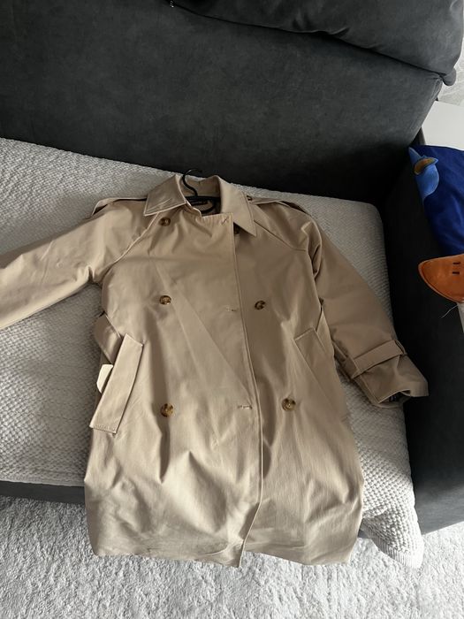 Продам тренч новый