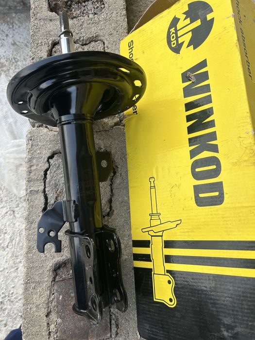 Амортизатор на камри 40