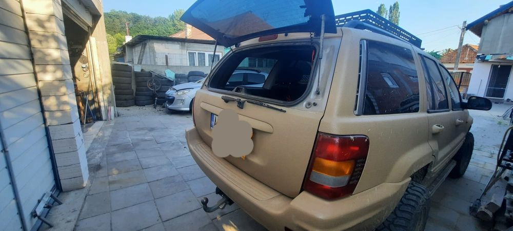 Jeep Grand Cherokee cu troliu 6 tone pregatit offroad stare impecabila