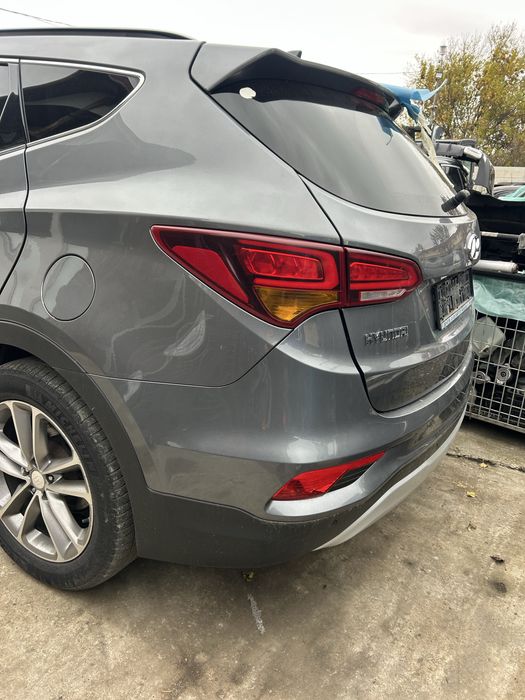 Aripă stanga spate Hyundai Santa Fe 2016