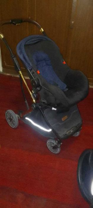 Детская коляска  три в одном