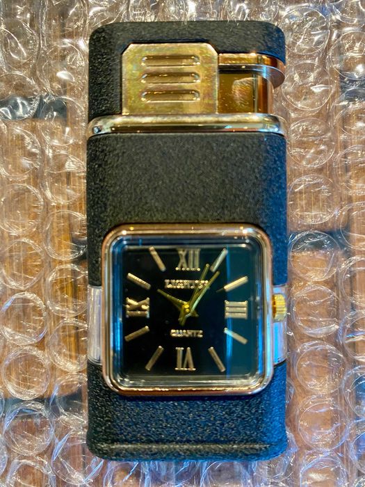 Подарок. Сувенир. Газова ветроустойчива запалка с часовник.