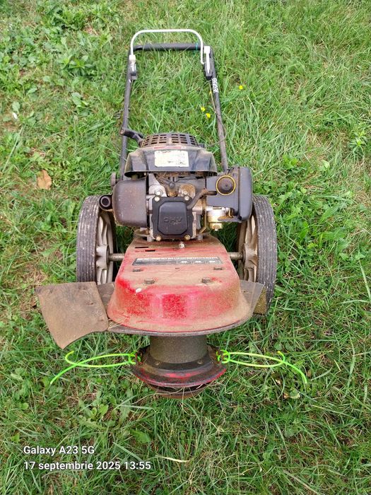 Motocoasa  pe doua roti cu fir