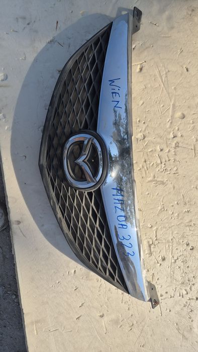 Оригинална Решетка за Мазда 323 98- 2003г